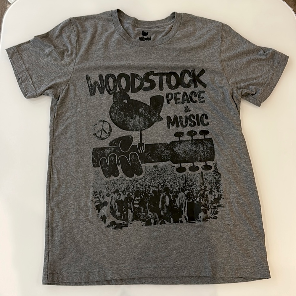 A wood stock t shirt size medium in dark grey